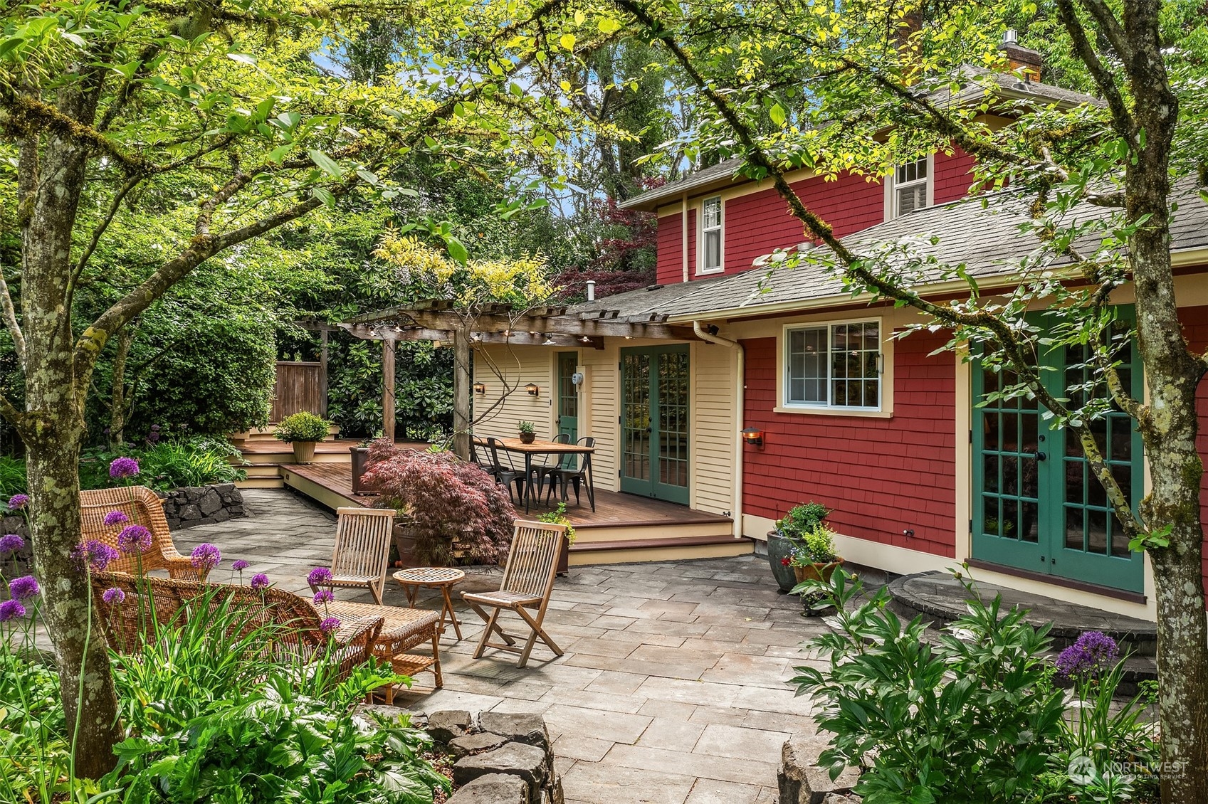 10810 Southwest Bank Road Vashon, WA 98070 - Photo 32 of 34 a view of backyard with table and chairs and potted plants