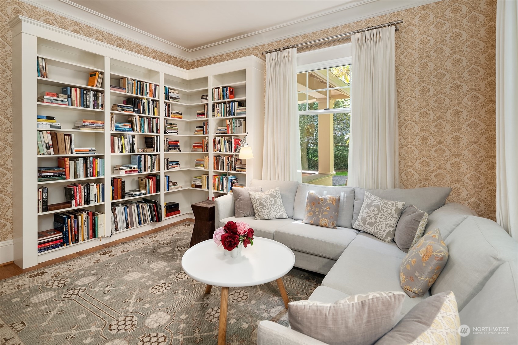 10810 Southwest Bank Road Vashon, WA 98070 - Photo 7 of 34 a living room with furniture and a book shelf