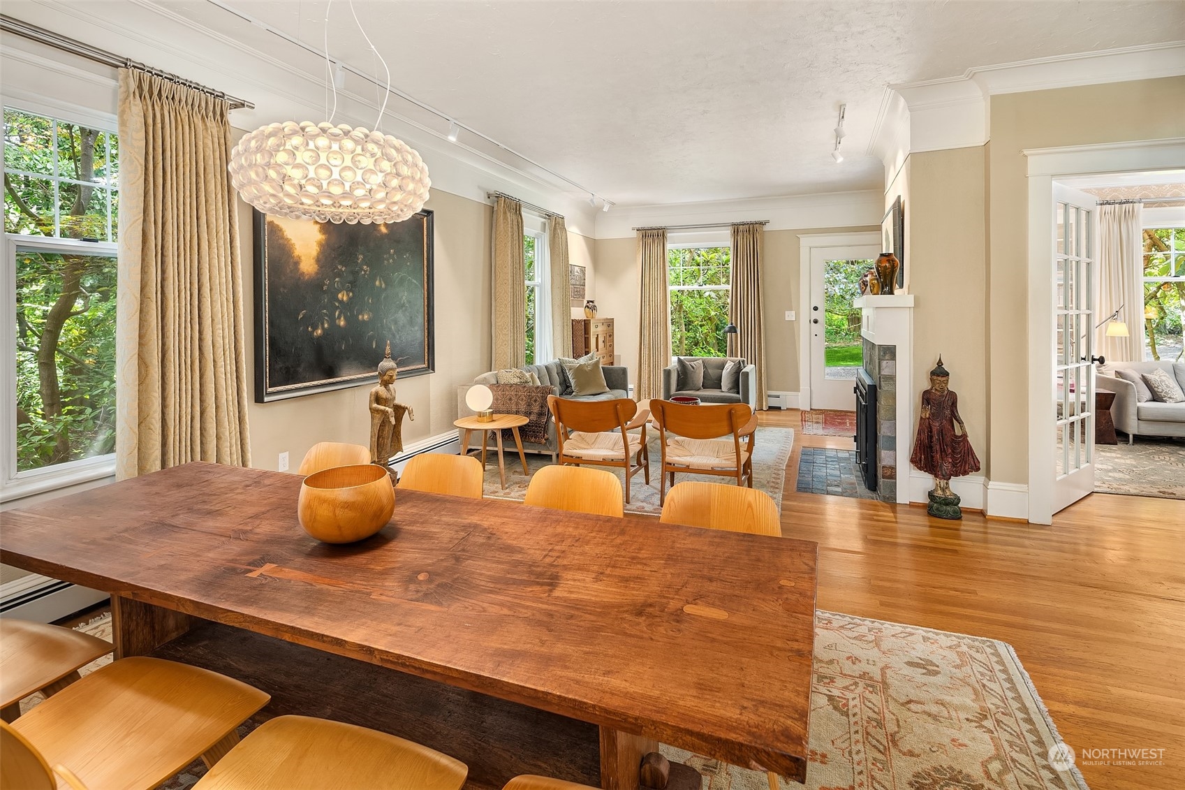 10810 Southwest Bank Road Vashon, WA 98070 - Photo 8 of 34 a living room with dining table furniture and a large window