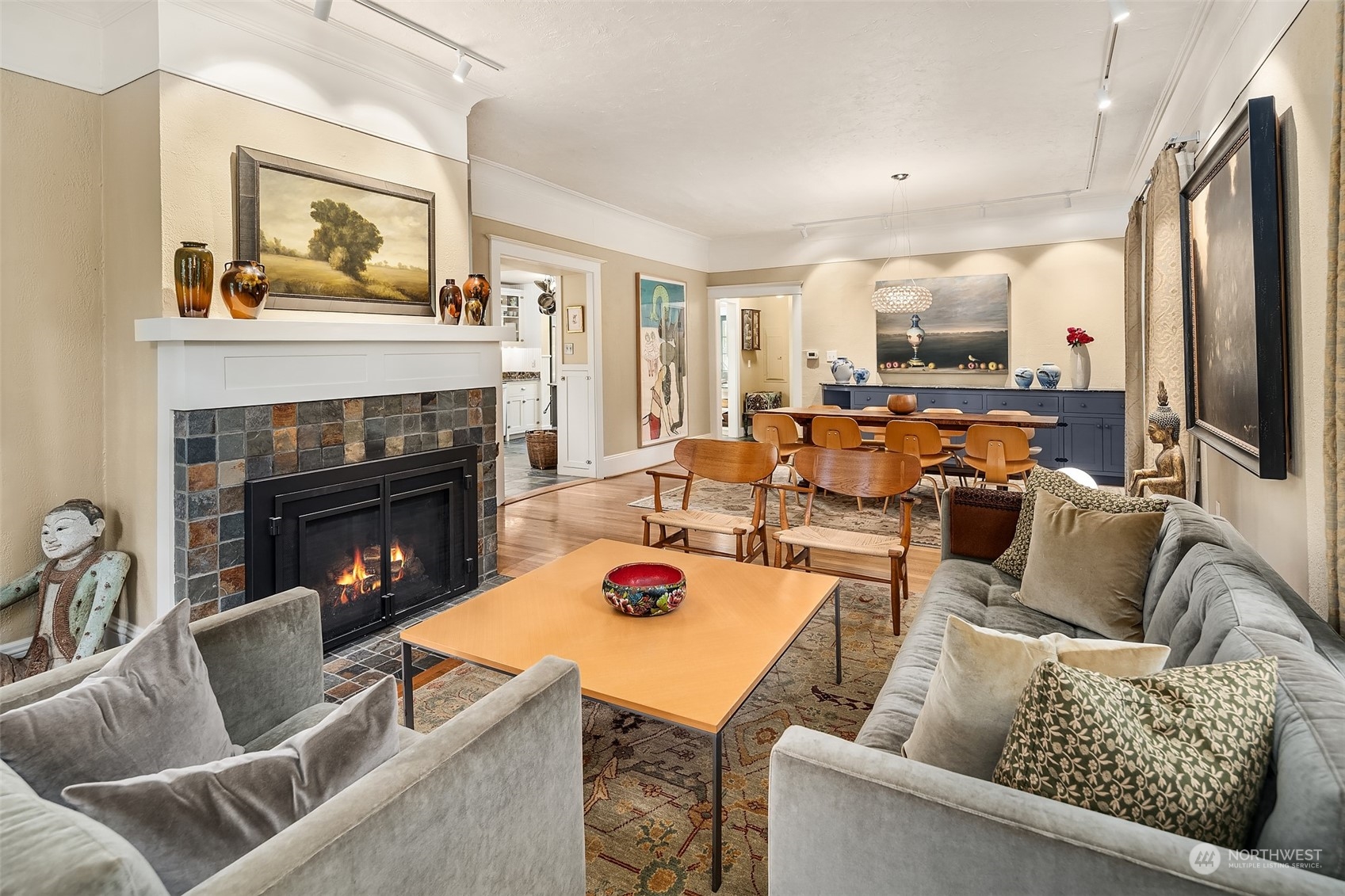 10810 Southwest Bank Road Vashon, WA 98070 - Photo 10 of 34 a living room with furniture and a fireplace