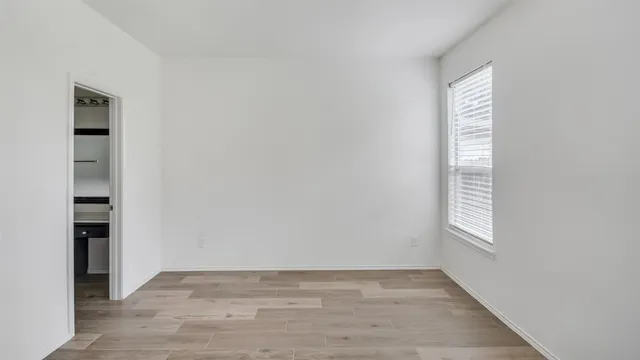 an empty room with windows