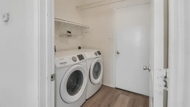 a utility room with dryer and washer
