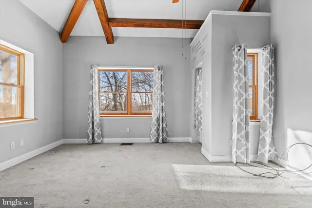 a bathroom with a sink a toilet and bathtub
