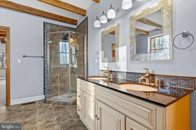 a white bath tub sitting next to a window