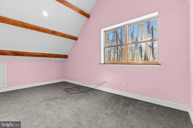 an empty room with a workbench