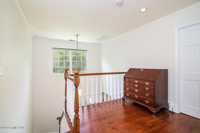 91 Winthrop Drive Riverside, CT 06878 - Photo 17 of 30 a living room with furniture and a window