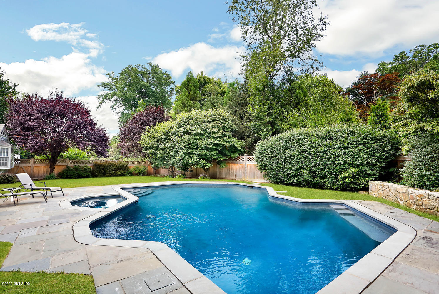 91 Winthrop Drive Riverside, CT 06878 - Photo 3 of 30 a view of a swimming pool with a yard
