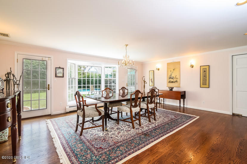 91 Winthrop Drive Riverside, CT 06878 - Photo 7 of 30 a view of a dining room with furniture window and wooden floor