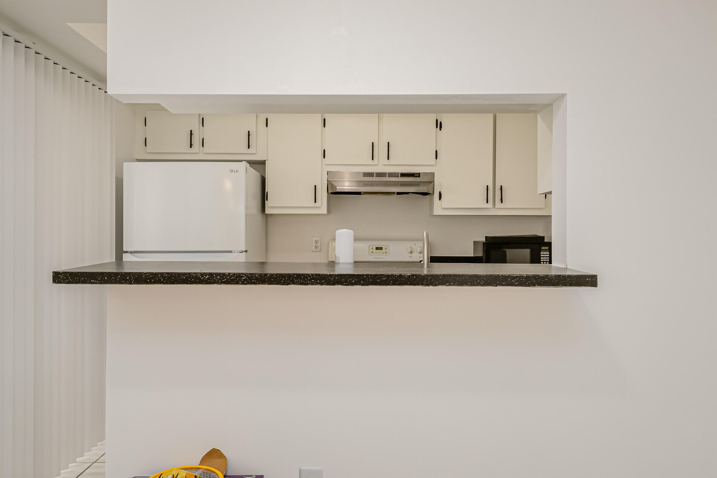 720 Ridge Club Drive, Unit 43 Melbourne, FL 32934 - Photo 2 of 27 Looking Into Kitchen
