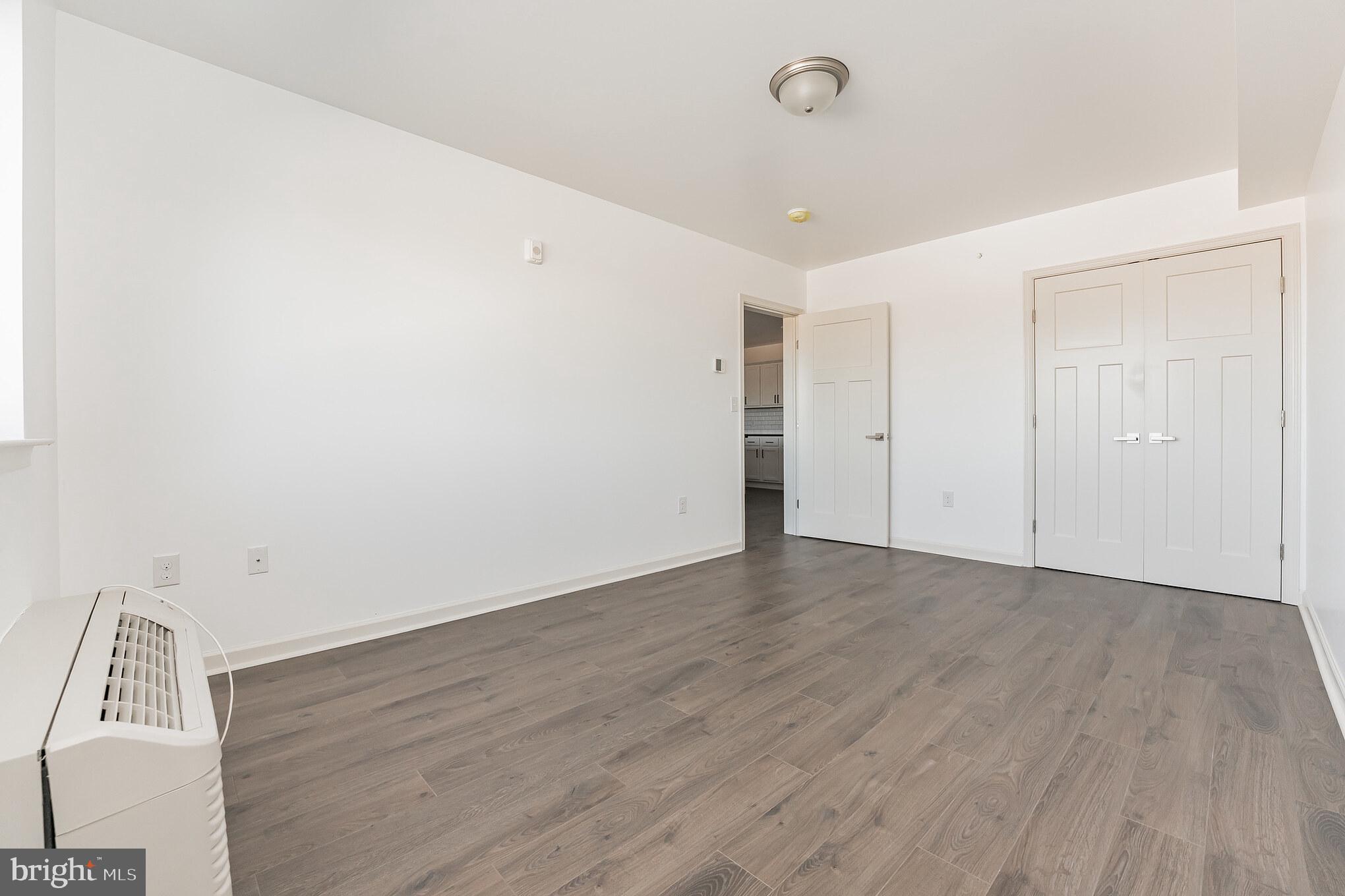 6649 Ridge Avenue, Unit A211 Philadelphia, PA 19128 - Photo 8 of 9 a view of an empty room