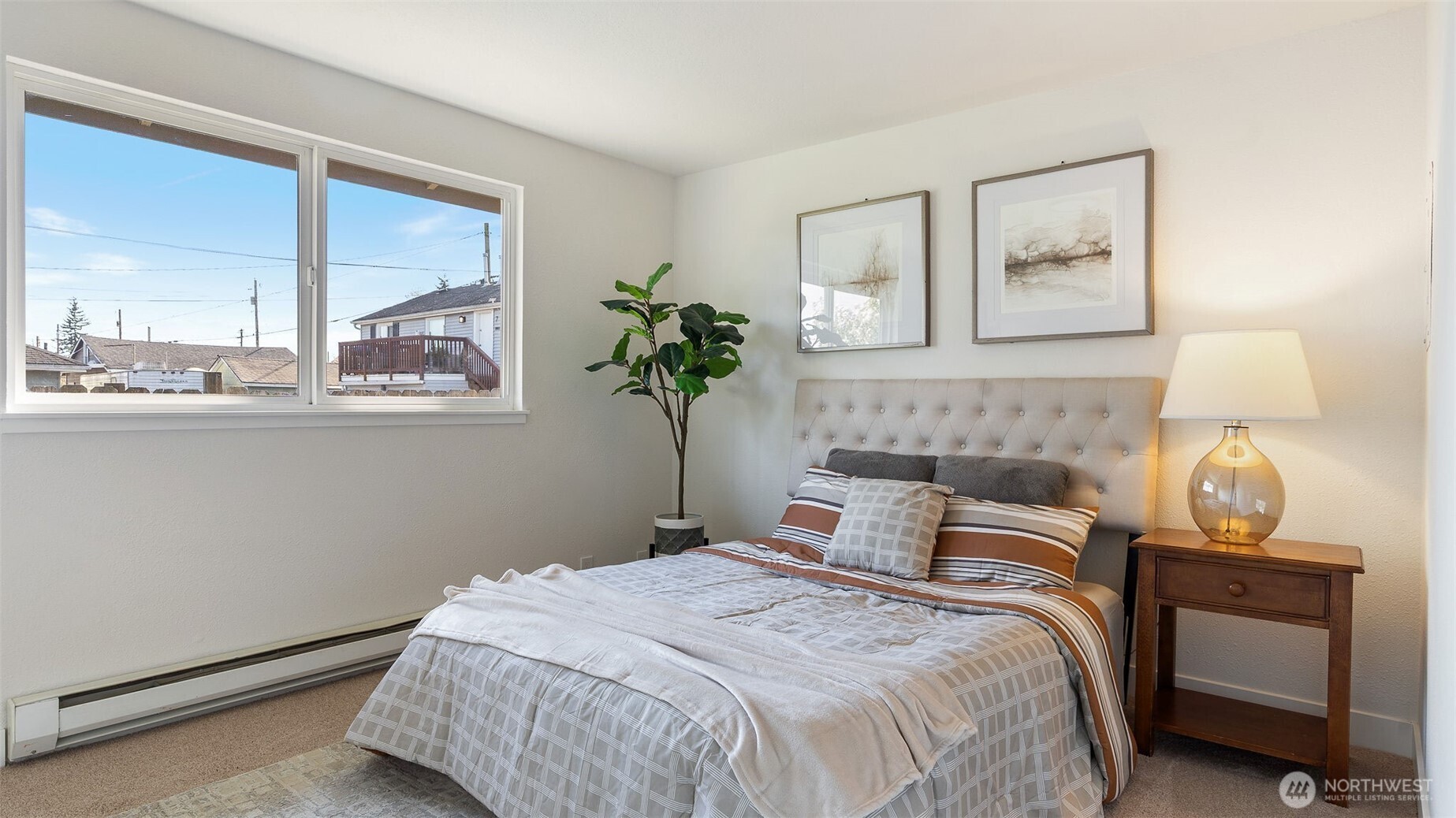 2520 Chestnut Street Everett, WA 98201 - Photo 15 of 29 a bedroom with a bed and window