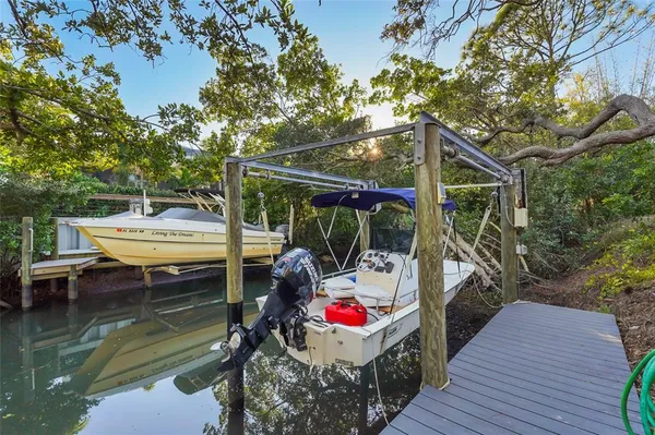 a view of a lake with a building in the background