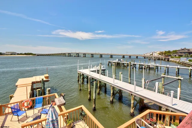 a view of a lake with a deck