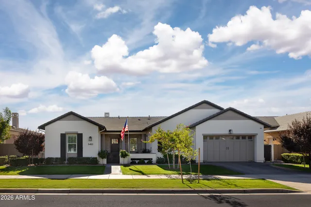 a view of house with yard and entertaining space