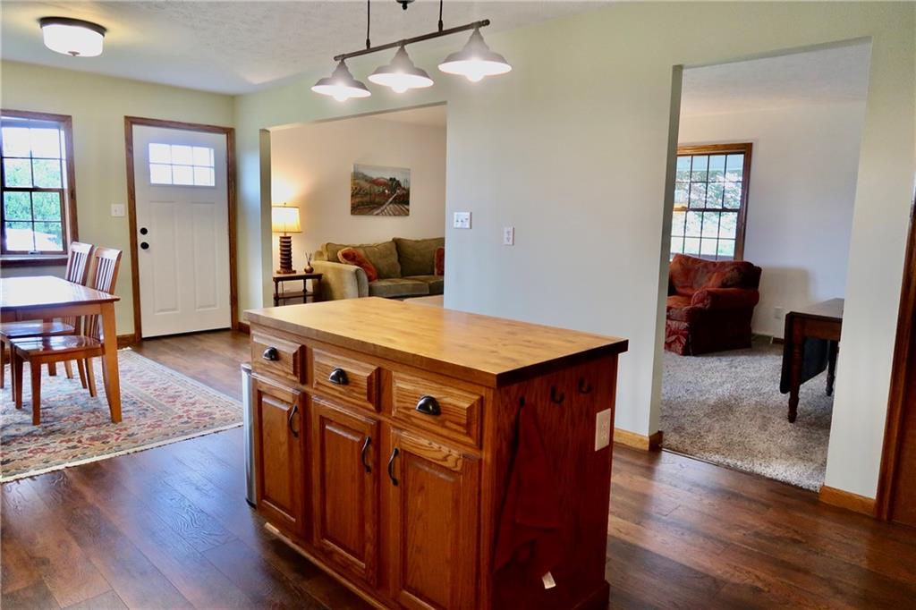 131 Olson Road Stoneboro, PA 16153 - Photo 11 of 49 a view of a dining room with furniture window and wooden floor