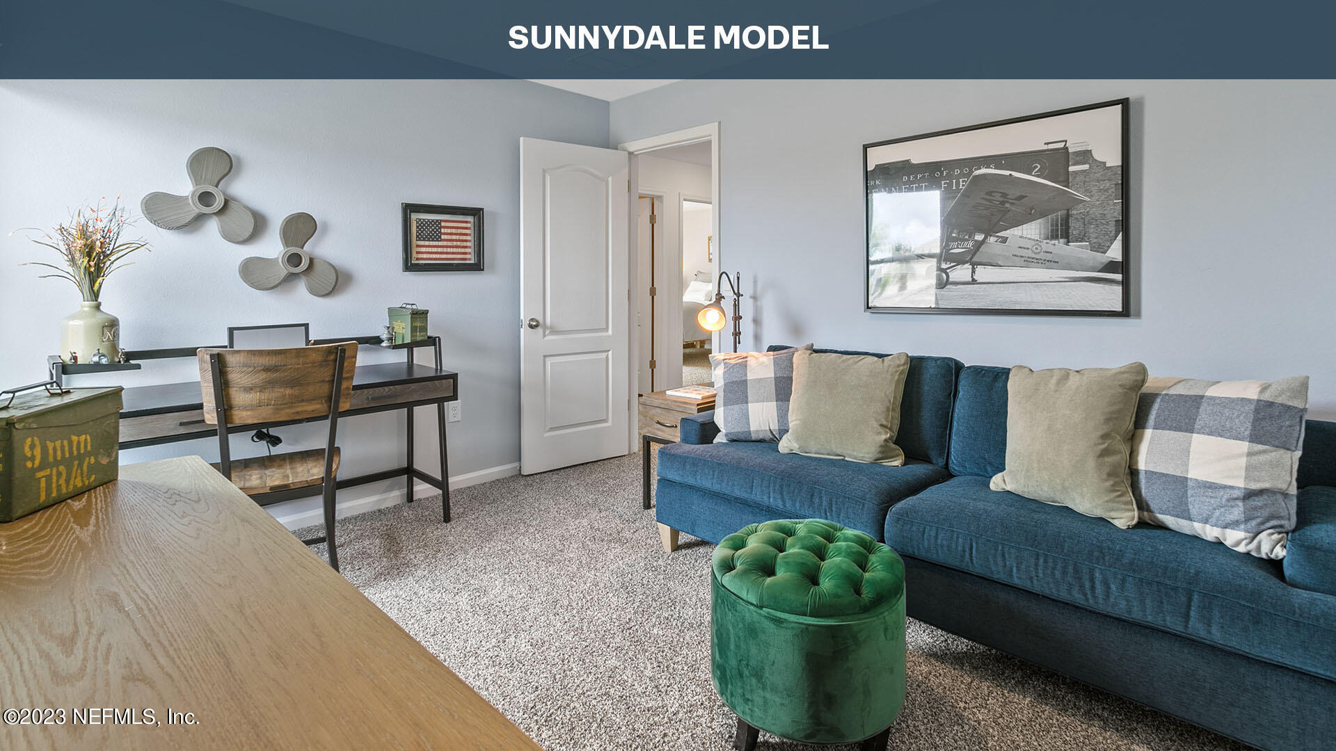 210 Albacete Rd Street St. Augustine, FL 32084 - Photo 13 of 32 a living room with furniture and a potted plant