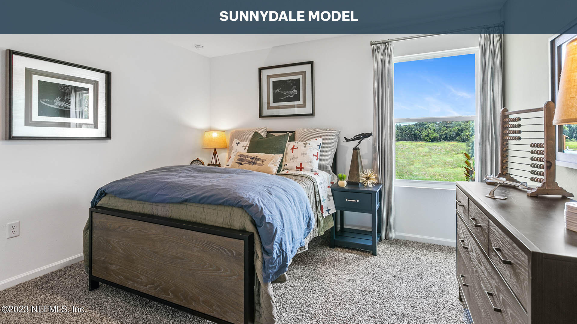 210 Albacete Rd Street St. Augustine, FL 32084 - Photo 14 of 32 a bed sitting in a bedroom next to a window