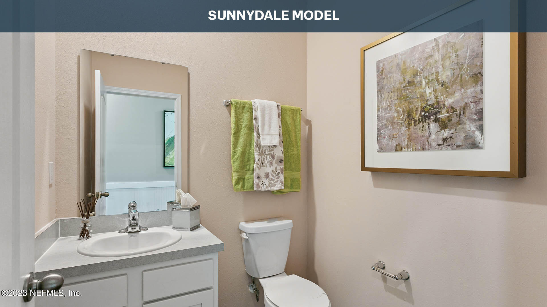 210 Albacete Rd Street St. Augustine, FL 32084 - Photo 17 of 32 a bathroom with a toilet a sink and mirror