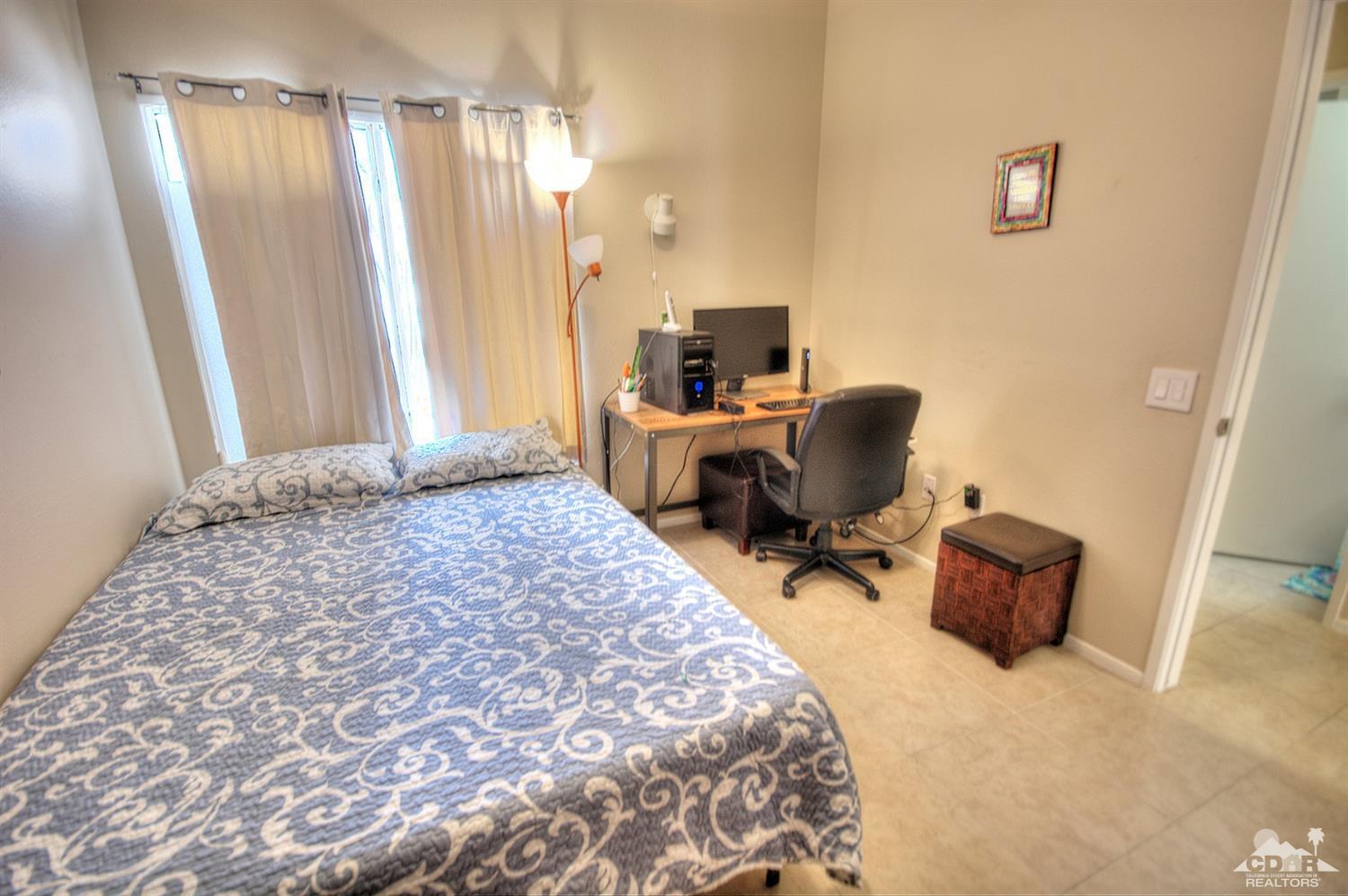 38590 Orangecrest Road Palm Desert, CA 92211 - Photo 15 of 23 a bedroom with a workspace