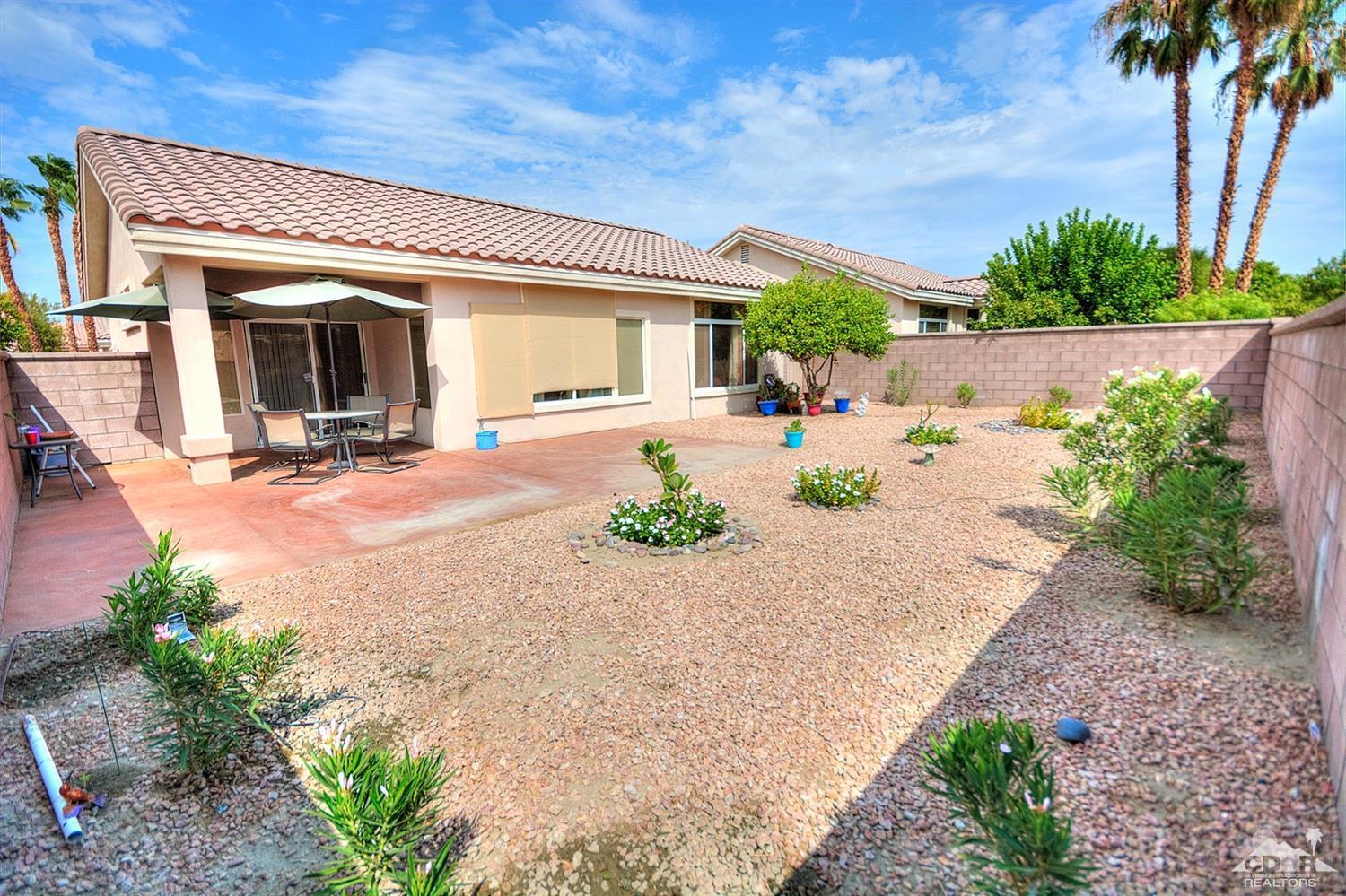 38590 Orangecrest Road Palm Desert, CA 92211 - Photo 18 of 23 a view of a house with backyard and sitting area
