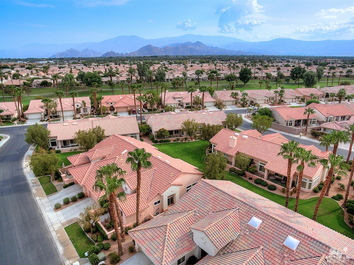 38590 Orangecrest Road Palm Desert, CA 92211 - Photo 21 of 23 an aerial view of a house with a lake view