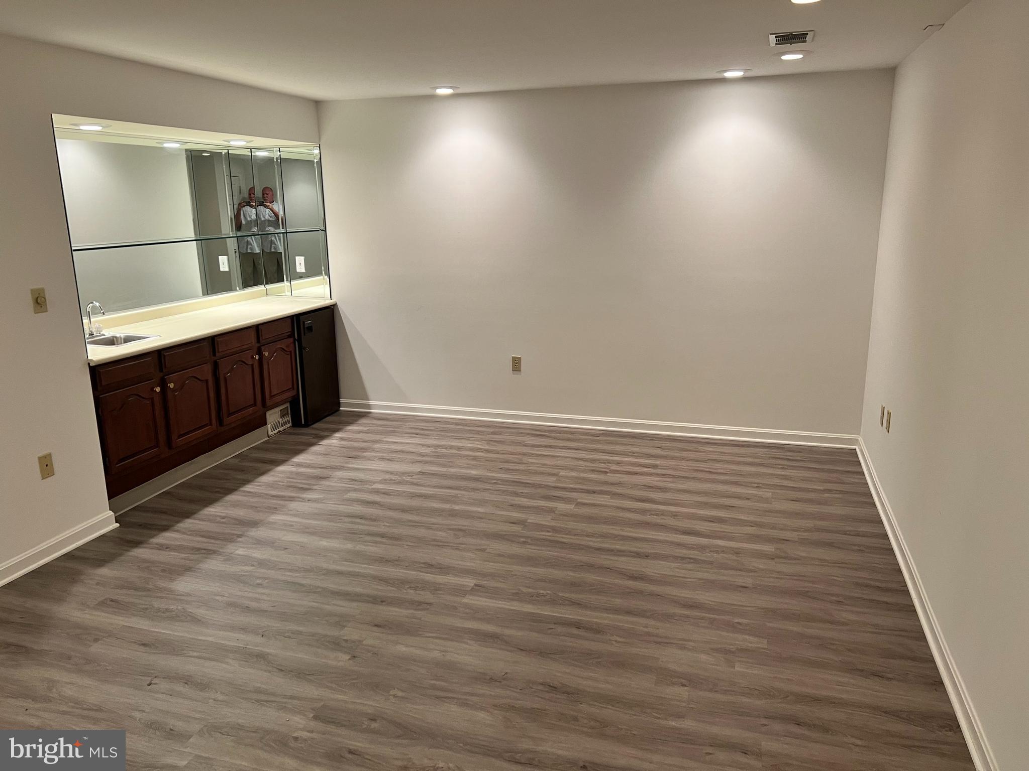 2053 Raleigh Road Hummelstown, PA 17036 - Photo 19 of 22 an empty room with wooden floor and windows