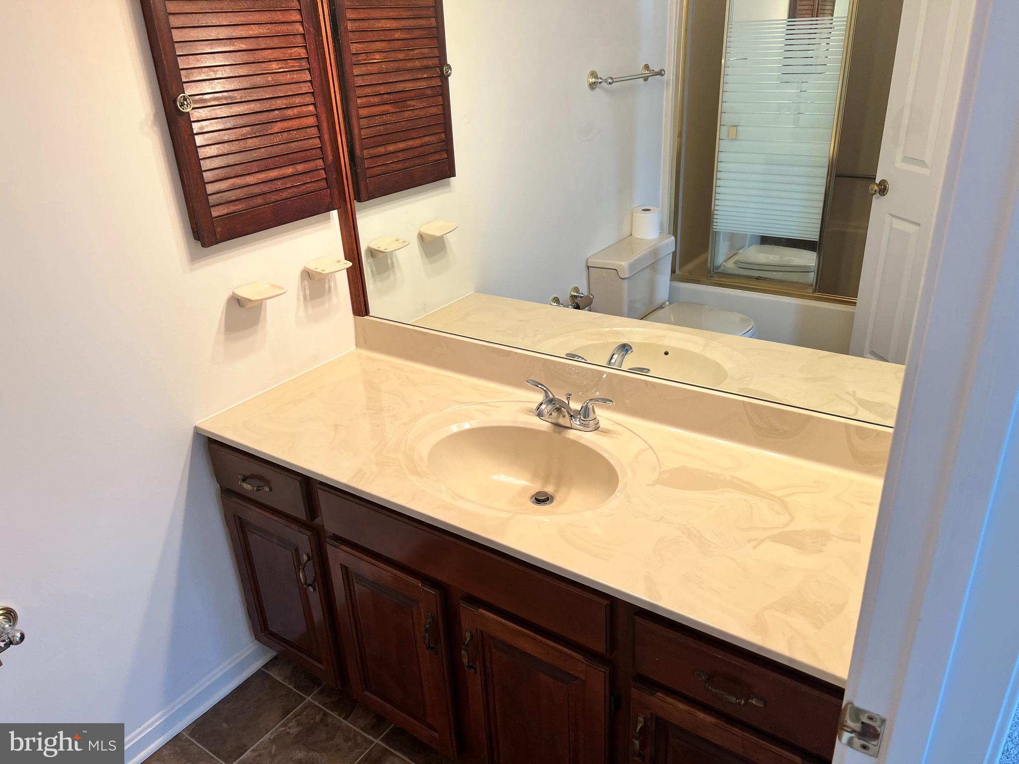 2053 Raleigh Road Hummelstown, PA 17036 - Photo 5 of 22 a bathroom with a sink and a mirror