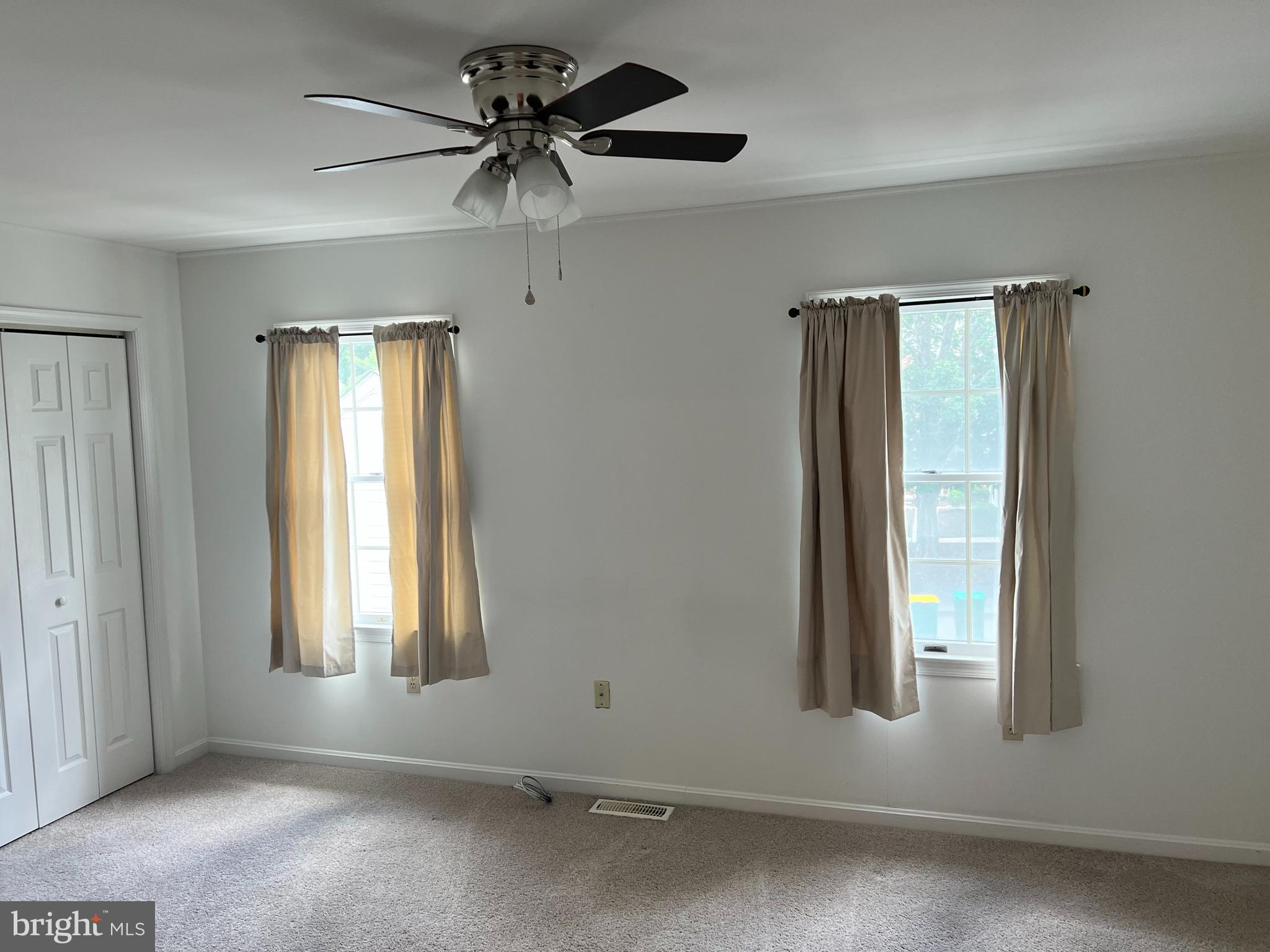2053 Raleigh Road Hummelstown, PA 17036 - Photo 7 of 22 an empty room with windows and closet