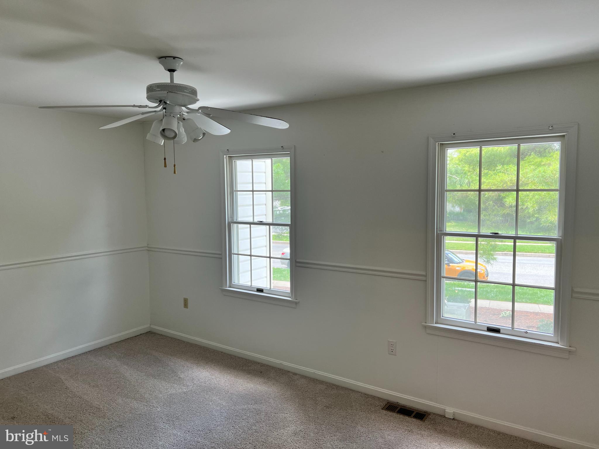 2053 Raleigh Road Hummelstown, PA 17036 - Photo 9 of 22 an empty room with a window and a fan