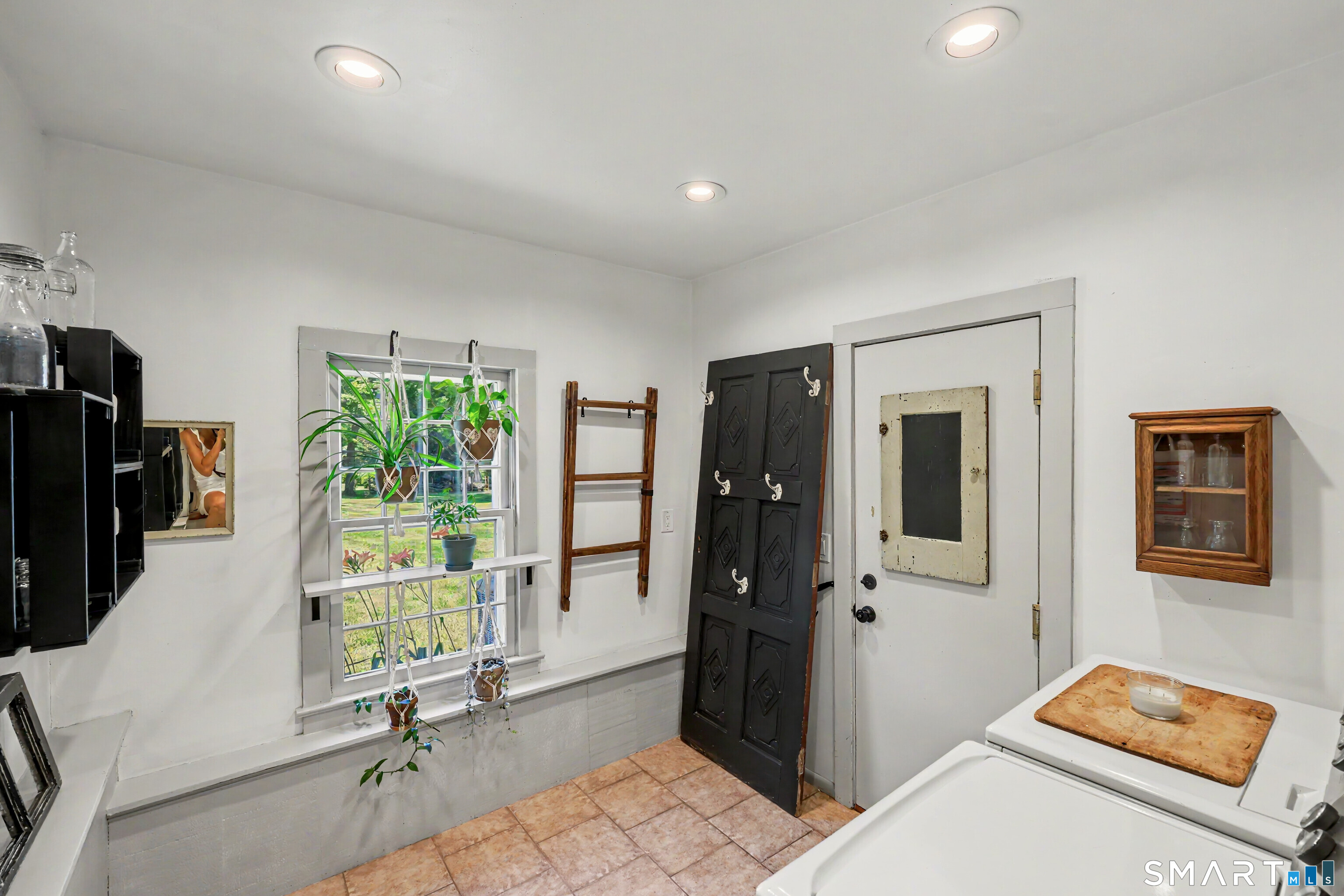 183 Range Road Wilton, CT 06897 - Photo 31 of 40 Laundry room has access to garage