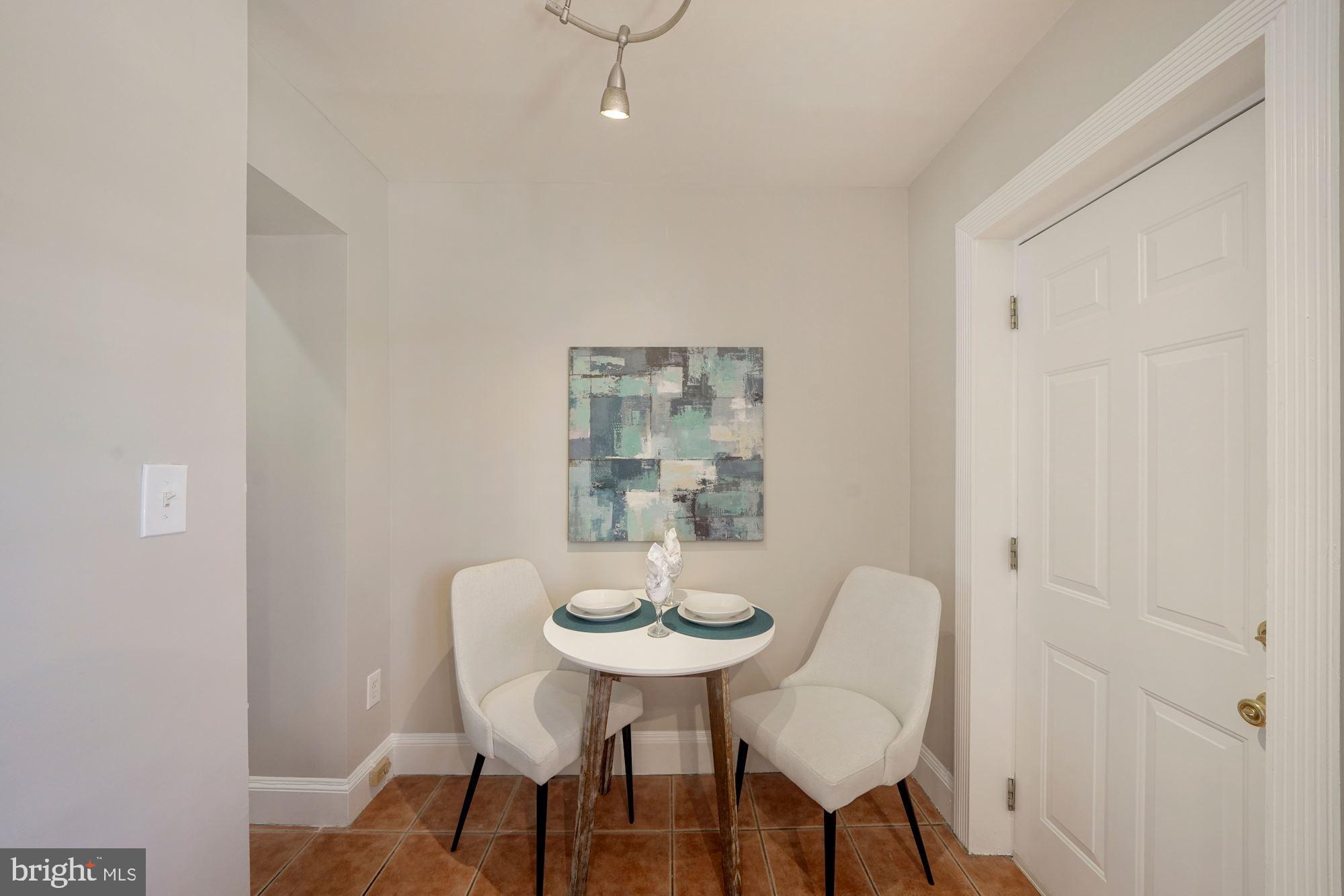 40 R Street Northwest Washington, DC 20001 - Photo 12 of 59 a view of a room with a table and chairs