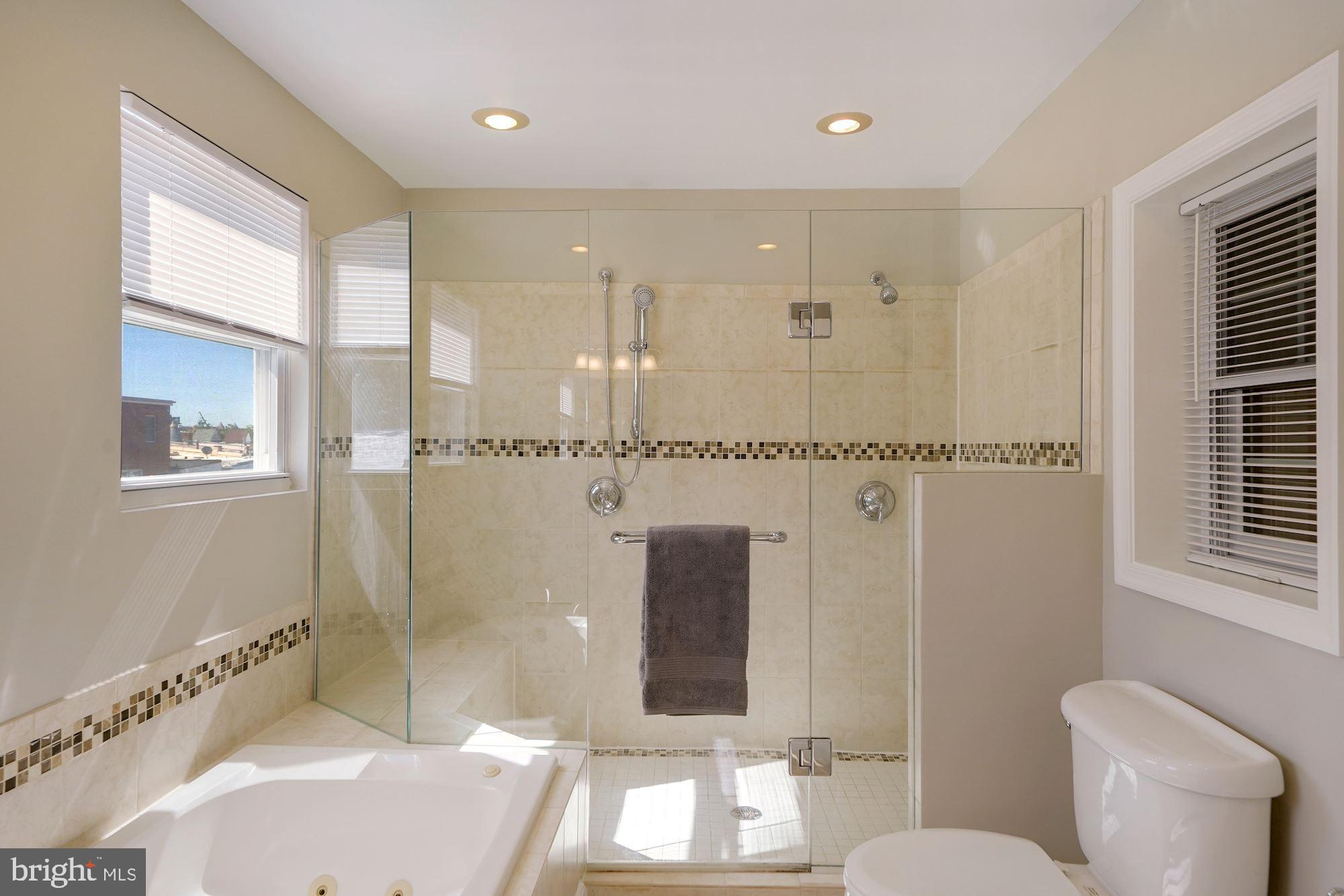 40 R Street Northwest Washington, DC 20001 - Photo 21 of 59 a bathroom with a sink toilet and shower