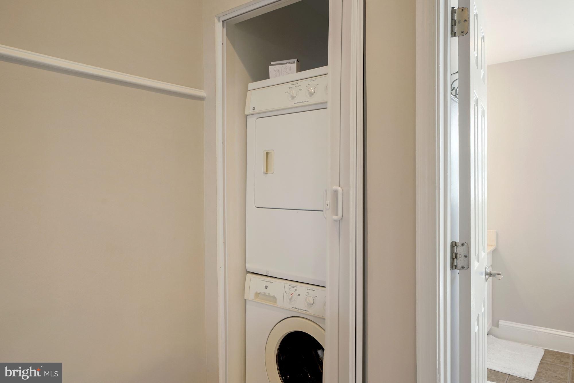 40 R Street Northwest Washington, DC 20001 - Photo 24 of 59 a view of a bedroom with washer and dryer