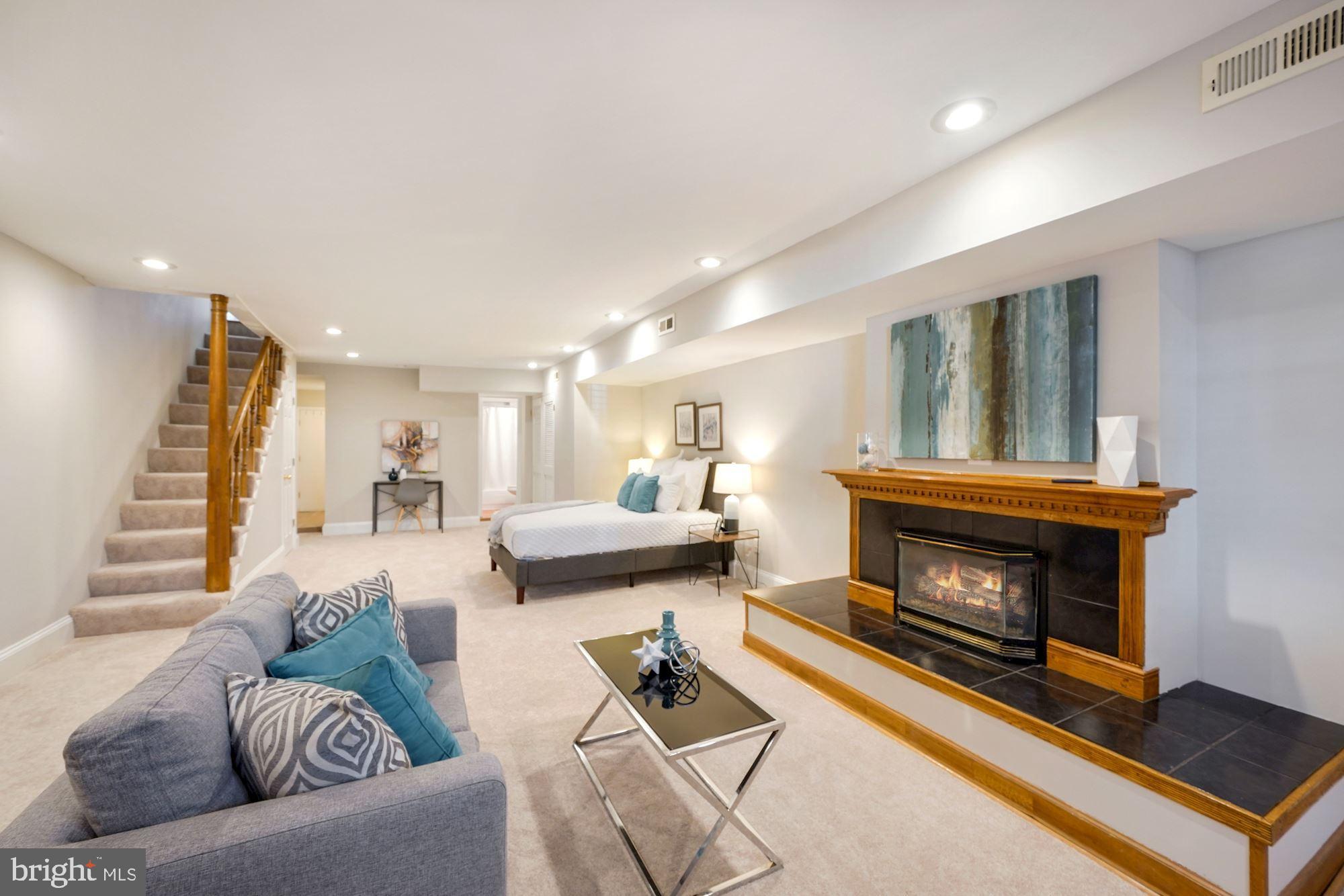 40 R Street Northwest Washington, DC 20001 - Photo 28 of 59 a living room with furniture and a fireplace