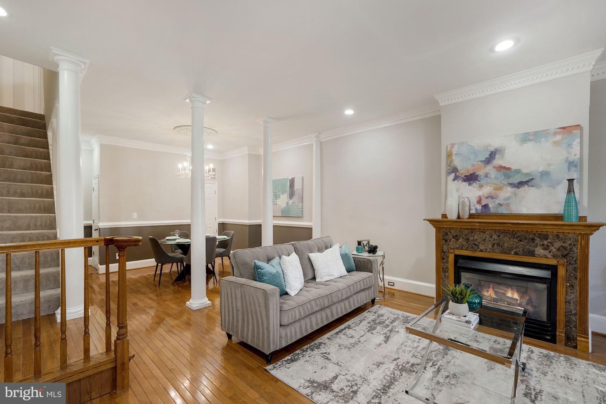 40 R Street Northwest Washington, DC 20001 - Photo 4 of 59 a living room with furniture and a fireplace