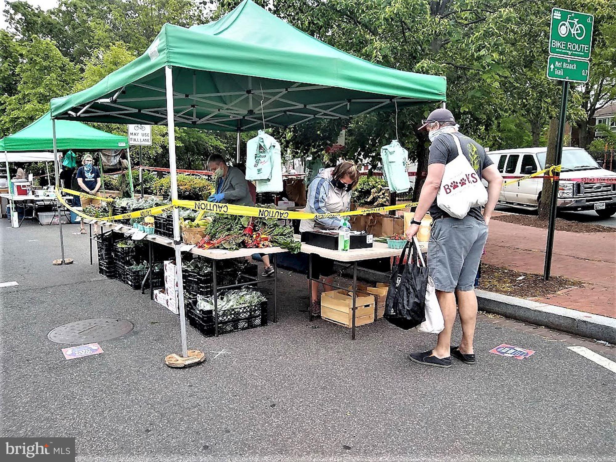 40 R Street Northwest Washington, DC 20001 - Photo 45 of 59 a view of a patio with table and chairs under an umbrella