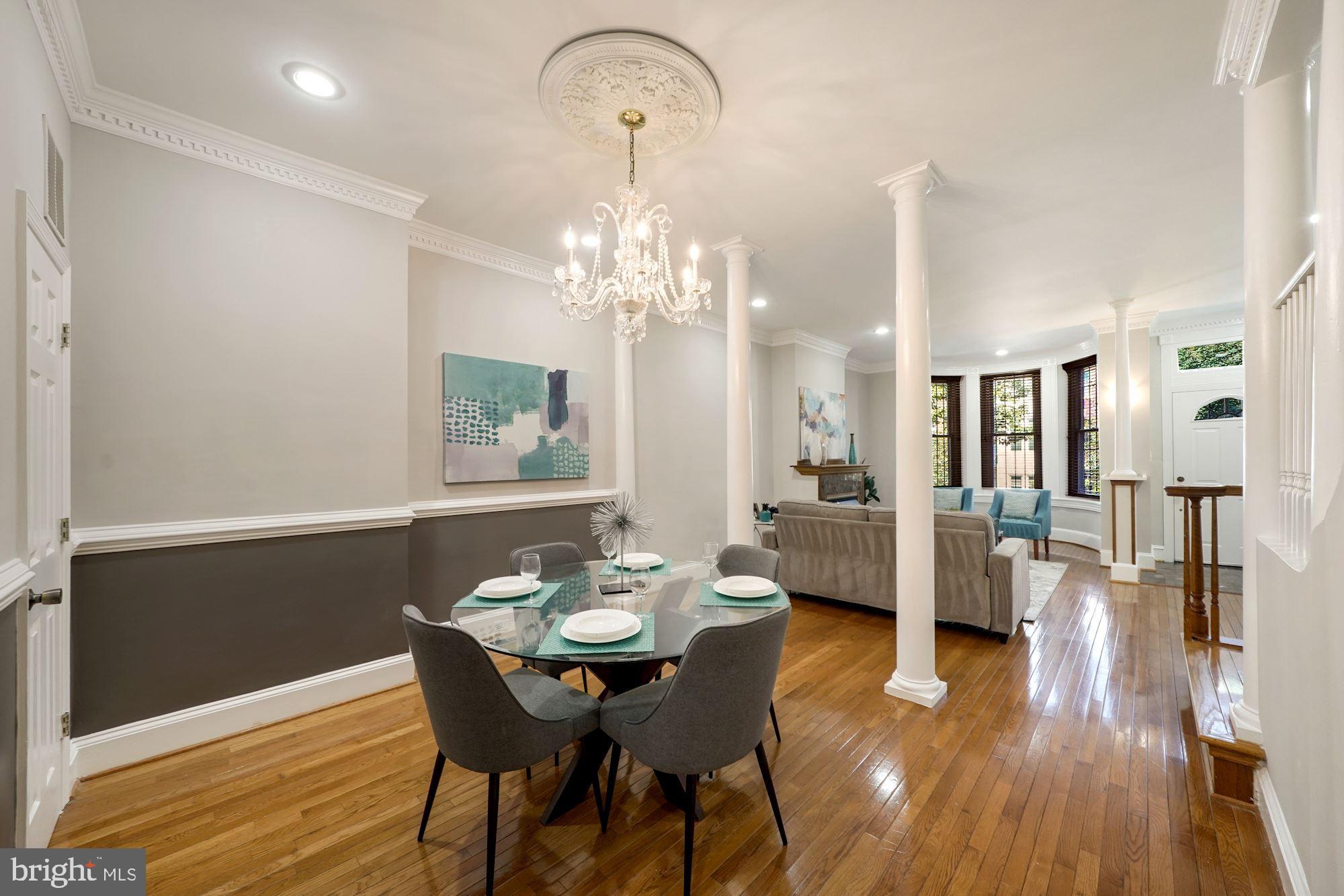 40 R Street Northwest Washington, DC 20001 - Photo 8 of 59 a view of a dining room with furniture and wooden floor