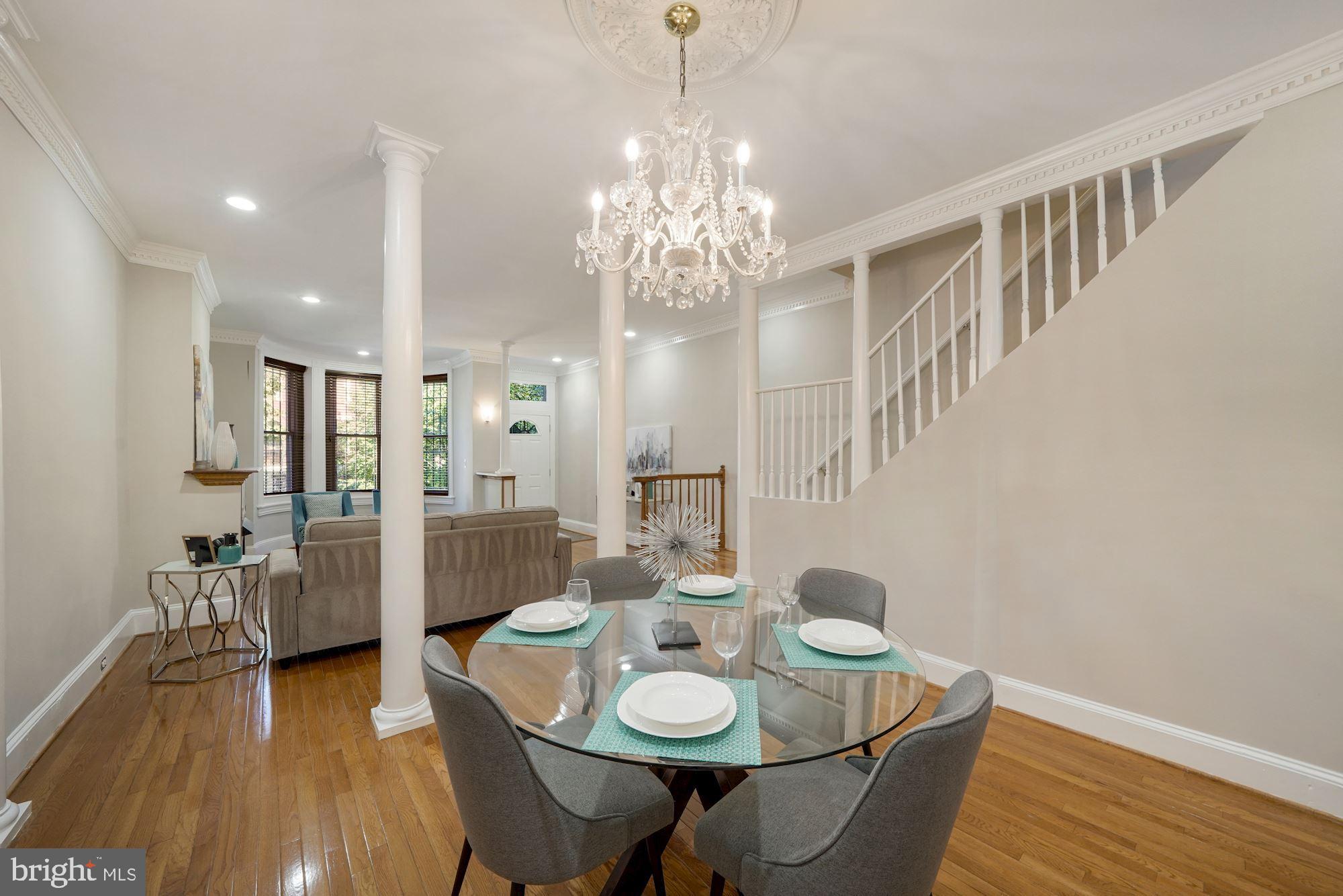 40 R Street Northwest Washington, DC 20001 - Photo 9 of 59 a view of a dining room with furniture and wooden floor