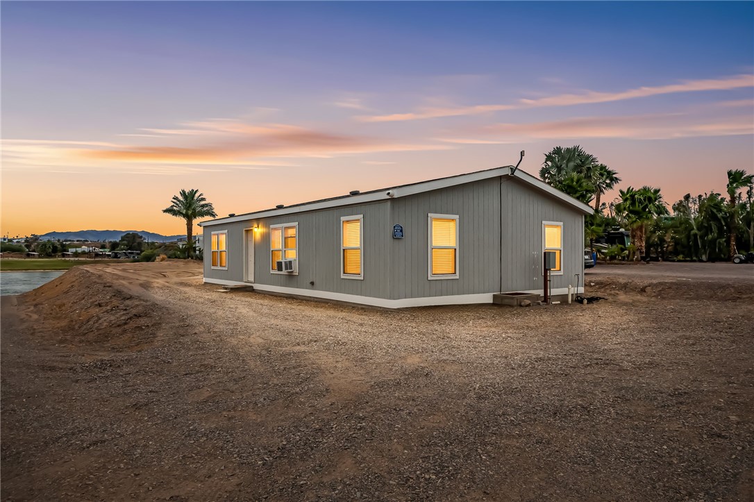 1286 Dike Road Mohave Valley, AZ 86440 - Photo 2 of 35 a view of a house with backyard