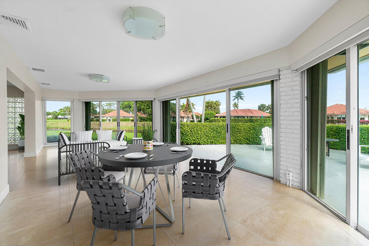 362 Yorktowne Circle Atlantis, FL 33462 - Photo 13 of 41 a dining room with furniture window and outside view