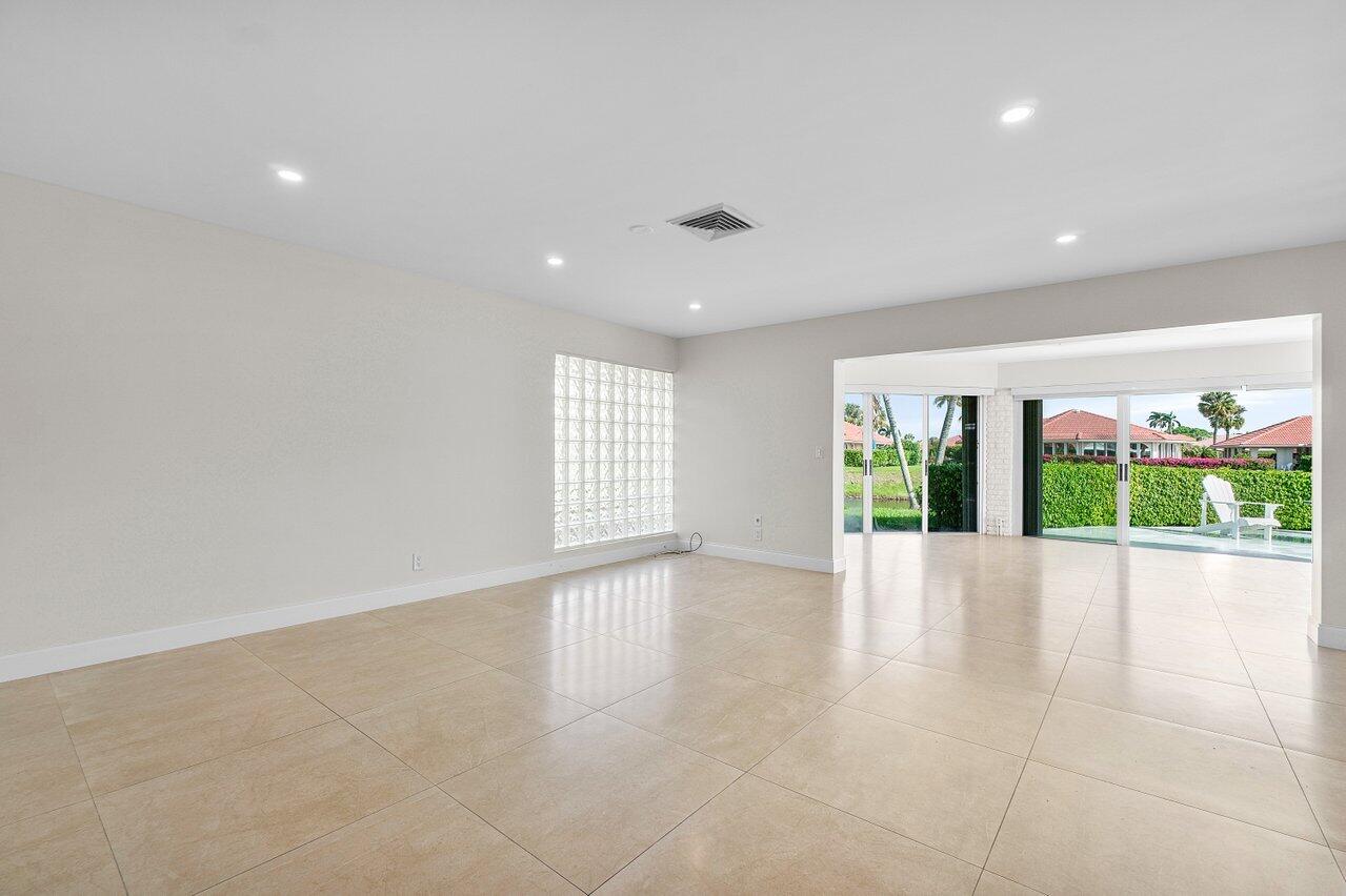 362 Yorktowne Circle Atlantis, FL 33462 - Photo 16 of 41 a view of an empty room with a window