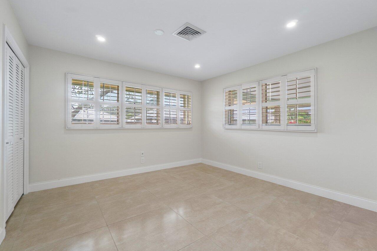 362 Yorktowne Circle Atlantis, FL 33462 - Photo 23 of 41 an empty room with a window