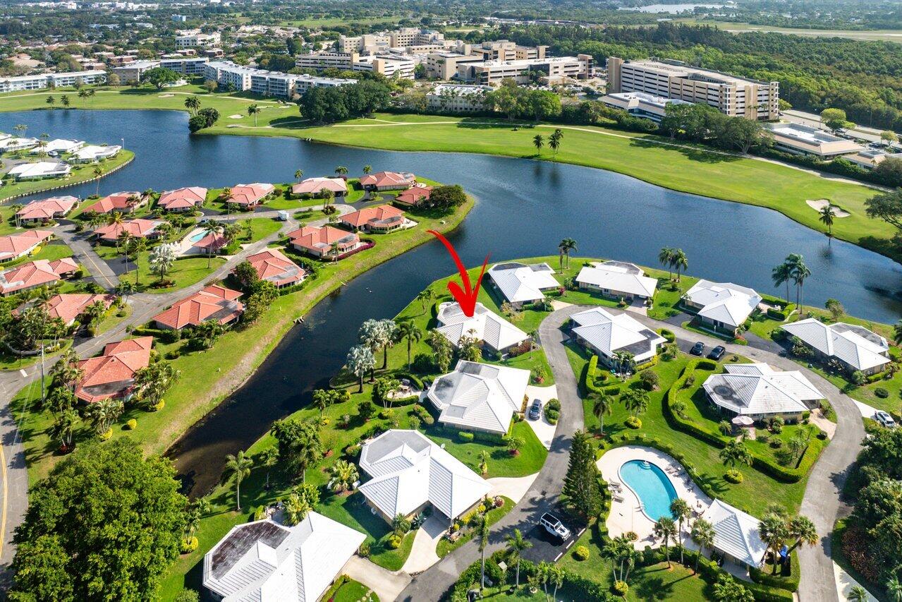 362 Yorktowne Circle Atlantis, FL 33462 - Photo 40 of 41 a view of a lake with a city