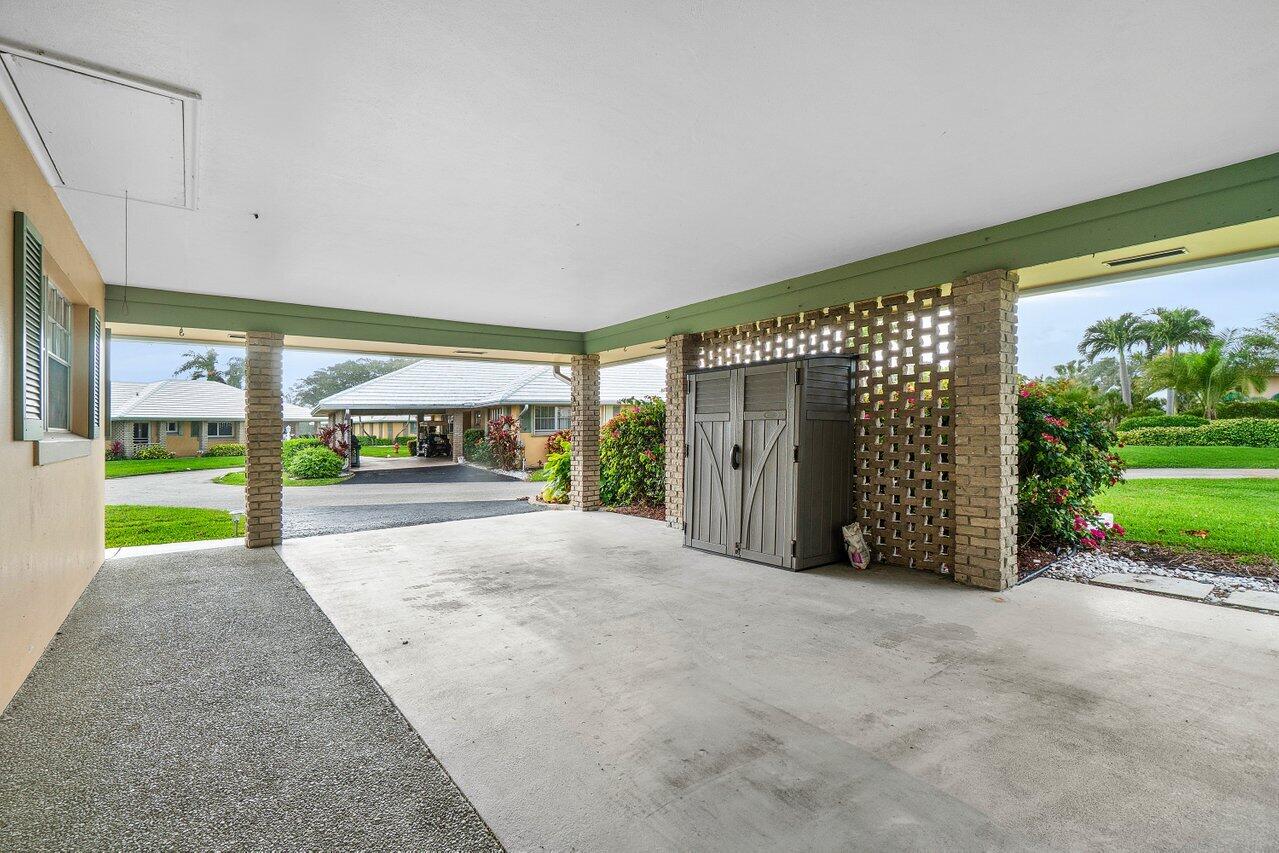 362 Yorktowne Circle Atlantis, FL 33462 - Photo 4 of 41 a view of a garden with an outdoor space