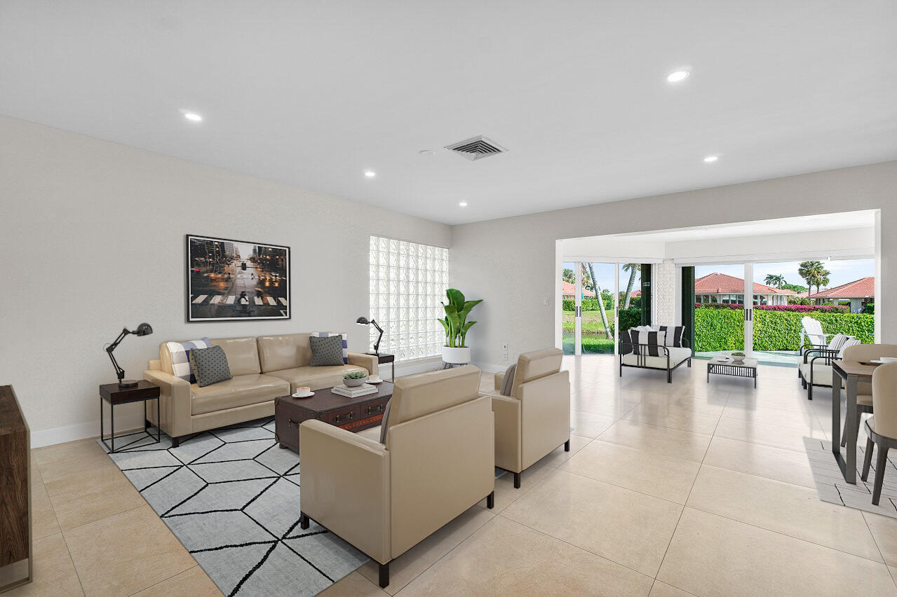 362 Yorktowne Circle Atlantis, FL 33462 - Photo 9 of 41 a living room with furniture and a table