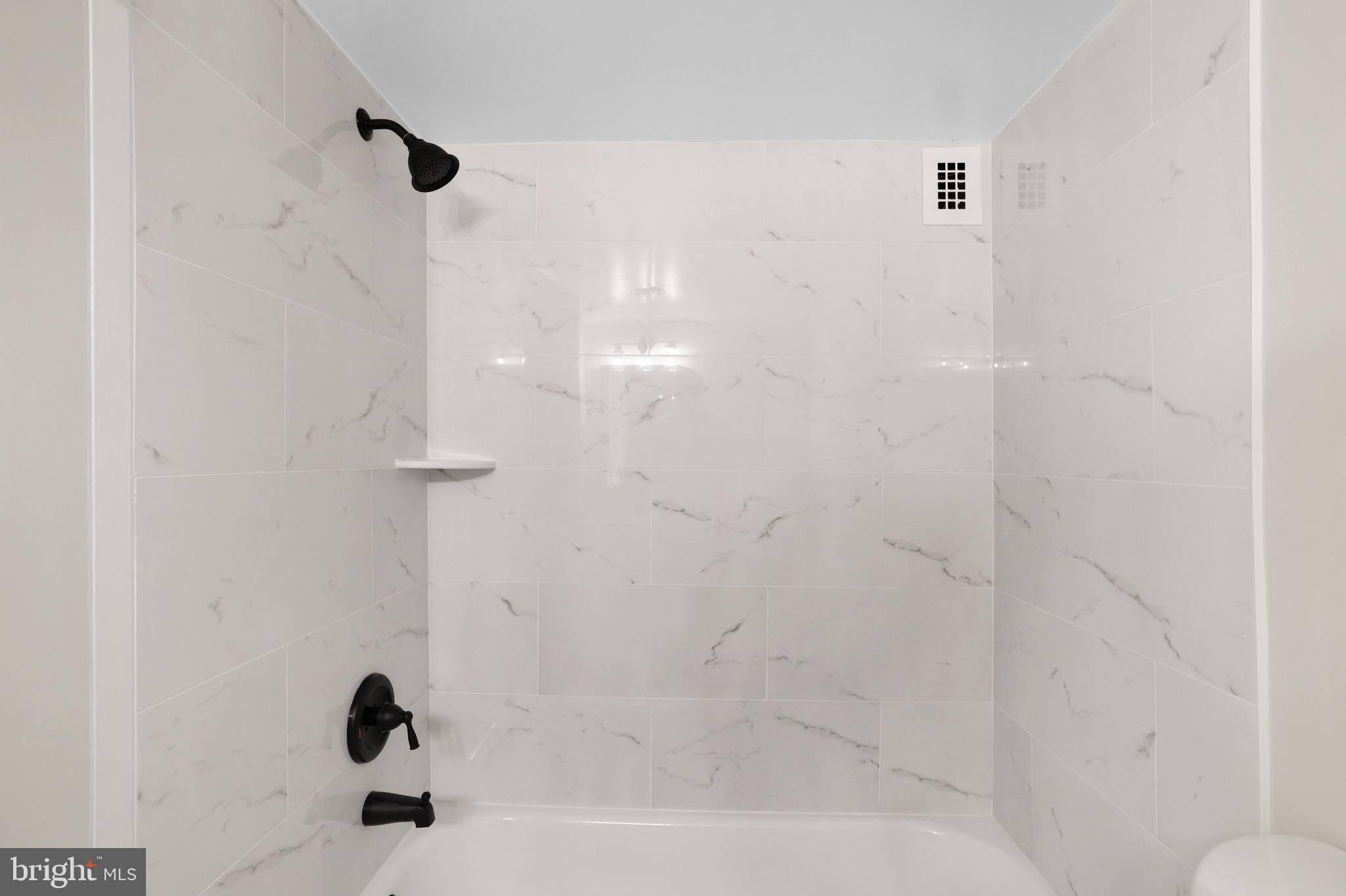1111 University Boulevard West, Unit 703A Silver Spring, MD 20902 - Photo 16 of 33 Brand NEW Owner's En-Suite Bathroom.