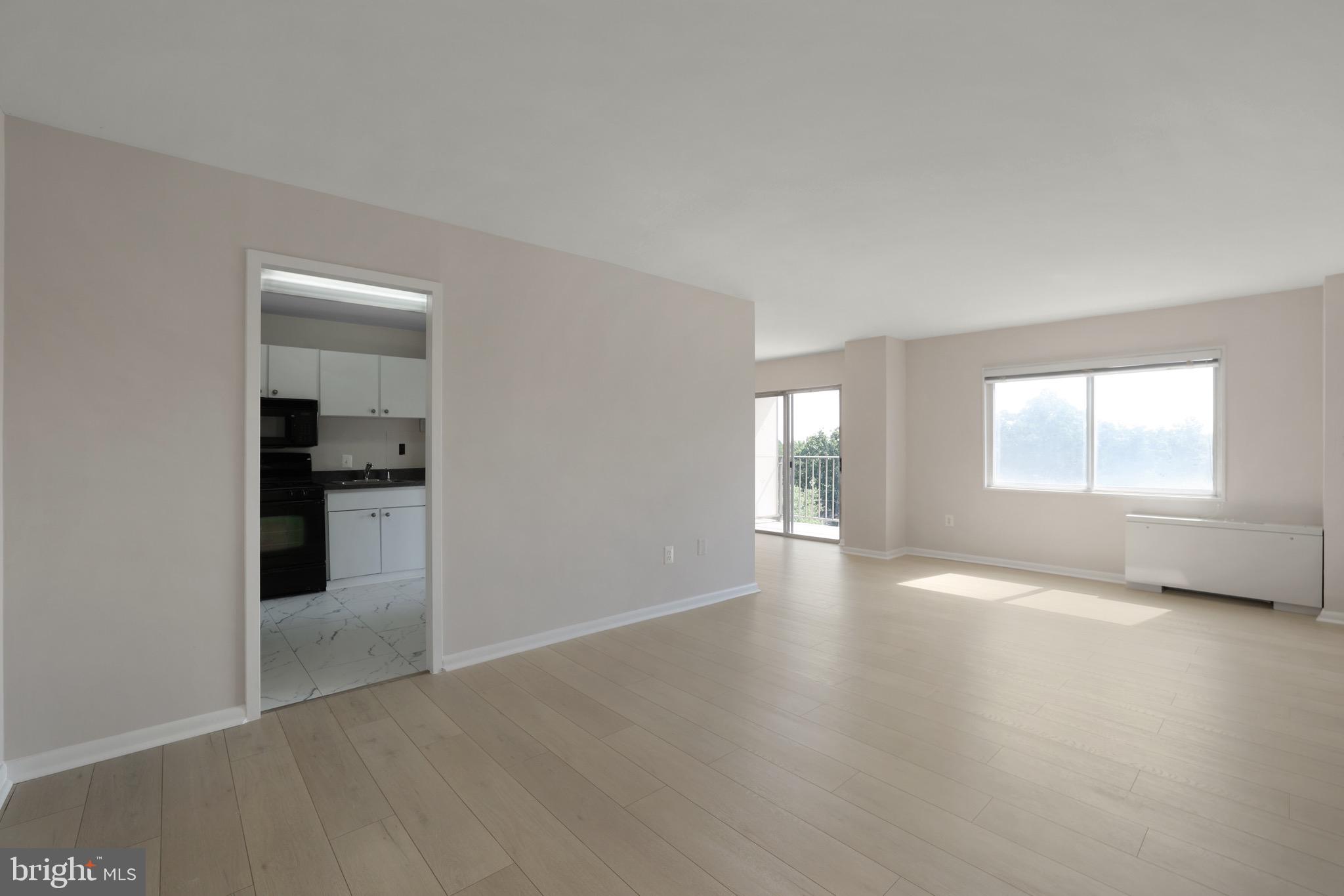 1111 University Boulevard West, Unit 703A Silver Spring, MD 20902 - Photo 2 of 33 Family Area | Brand New LVP Flooring.