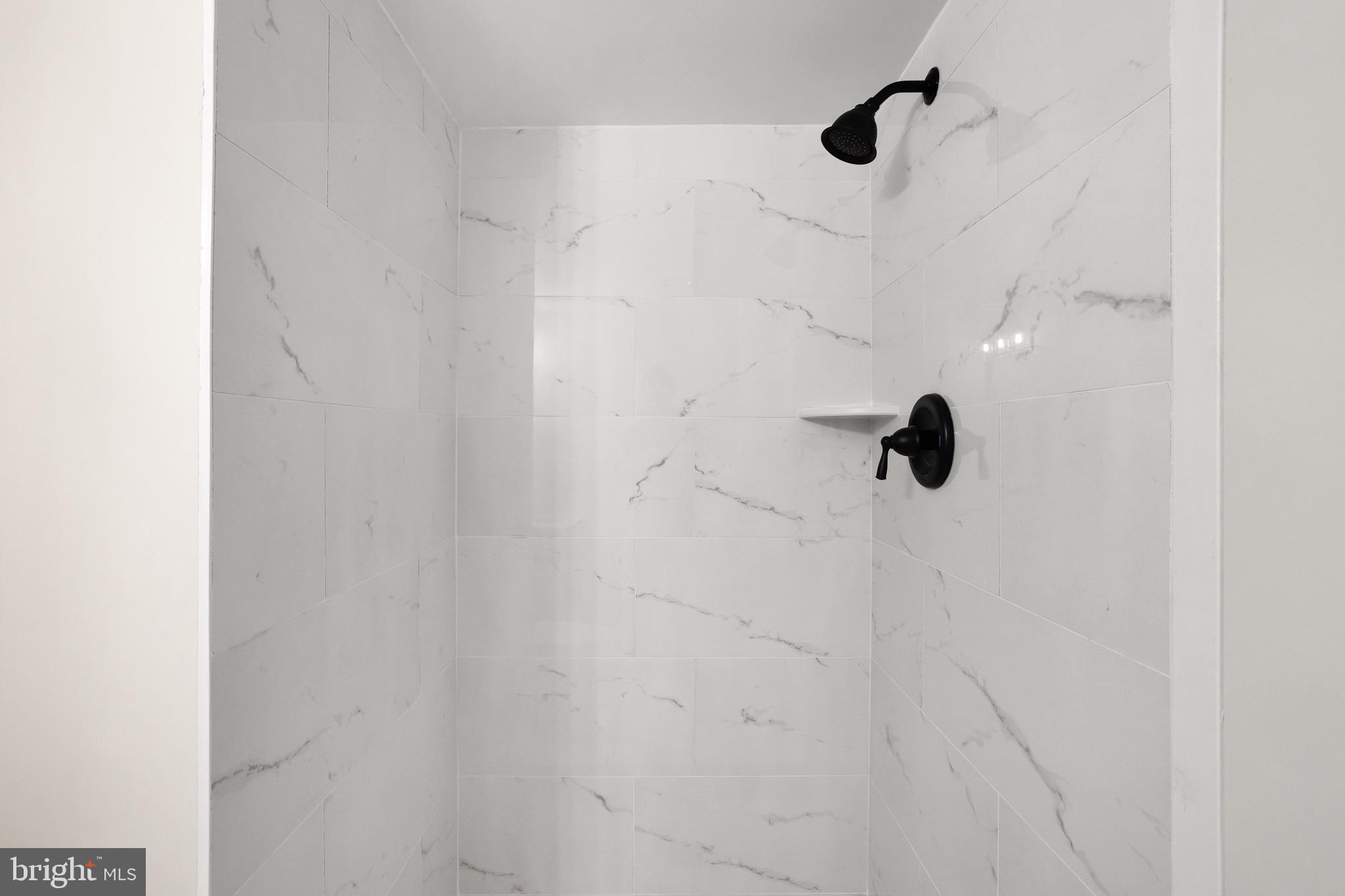 1111 University Boulevard West, Unit 703A Silver Spring, MD 20902 - Photo 23 of 33 Brand NEW Bathroom #2.