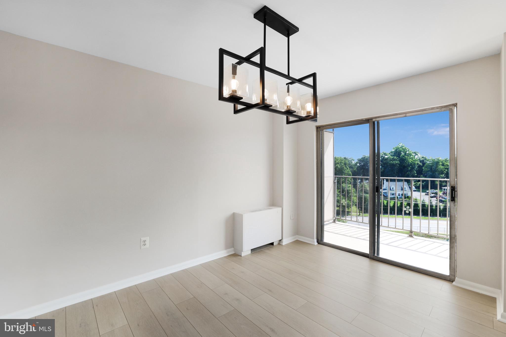 1111 University Boulevard West, Unit 703A Silver Spring, MD 20902 - Photo 7 of 33 Dining Room | Brand NEW LVP | Balcony Access.