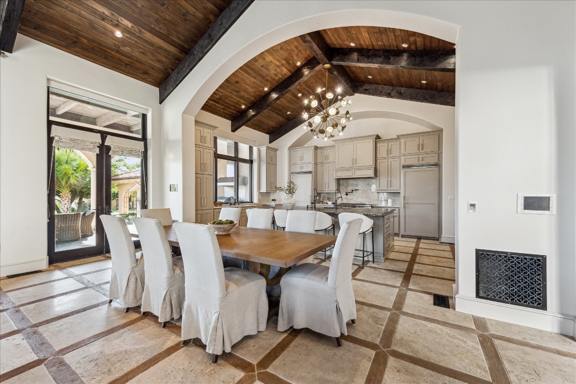 9 Rue Boerne, TX 78006 - Photo 20 of 50 a dining room with furniture a rug and wooden floor